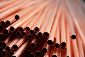 stack of copper pipes